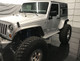 Silver powder coated GenRight Rockers on Silver 2 door JK